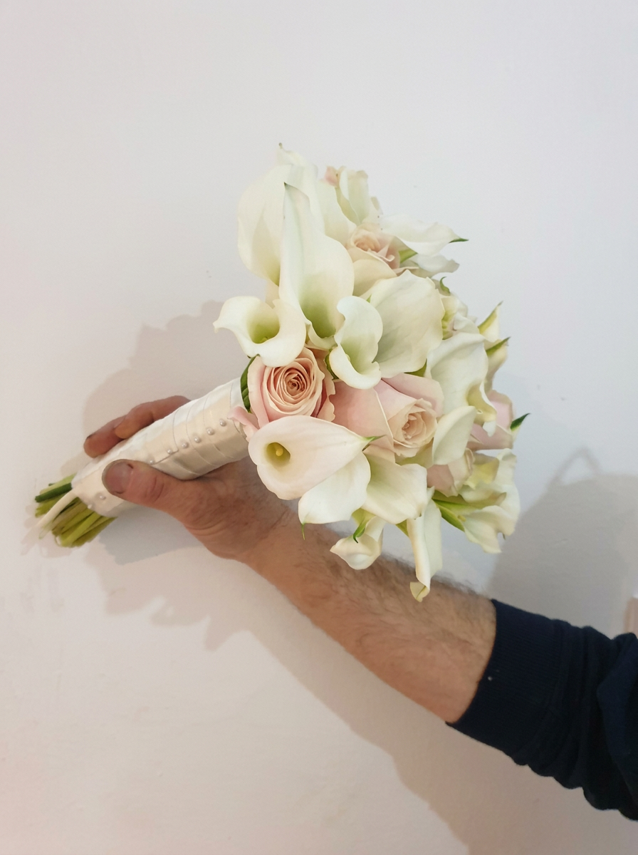 White calla lily bridal bouquet by Anne's Florist.